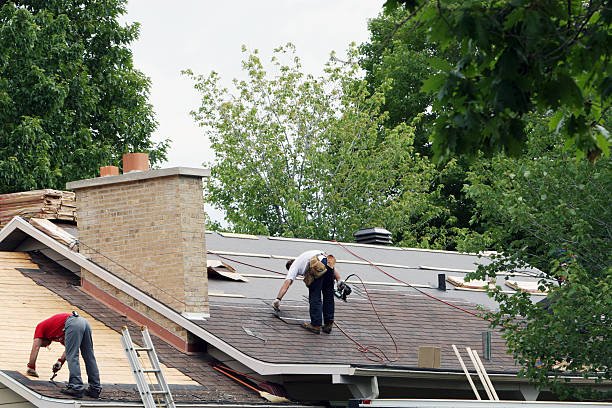 Men installing a new roof on a house