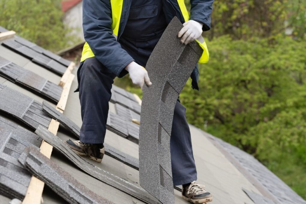 A roofer showing What does a roof inspector do